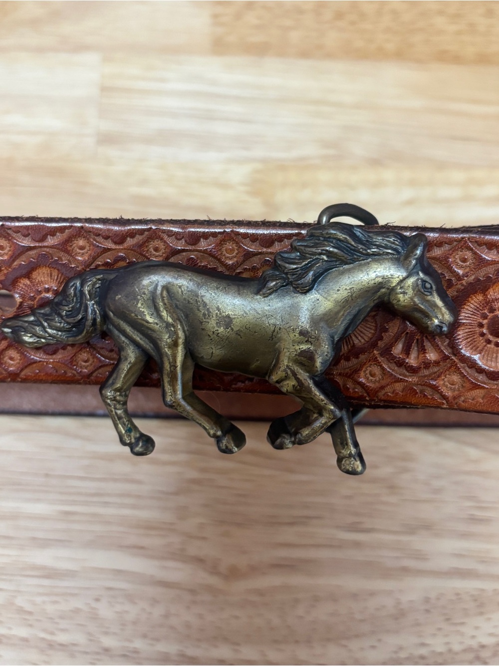 Tooled leather belt with Horse buckle